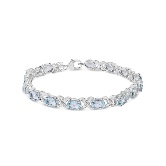 Sterling Silver 16.0 Oval Blue Topaz and Diamond Accent Tennis X Link Bracelet
